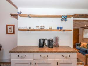 a kitchen with a counter top in a room at Park Cottage in Kingsbridge