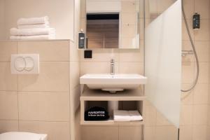 Phòng tắm tại Brit Hotel Cahors - Le Valentré