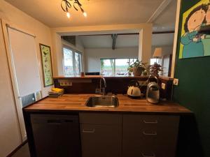 Fotografie z fotogalerie ubytování Gastenhuisje De Donk v destinaci Brandwijk + 3 fotografie