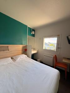 En eller flere senge i et værelse på hotelF1 Brest Sud Plougastel
