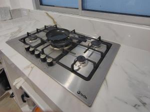 een kookplaat met een pot erop bij CASA VILLA NICA Nariño Cundinamarca in Nariño