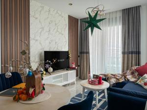 Posezení v ubytování Qoople Excellence apartments by the sea