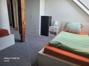 Giường trong phòng chung tại Ubytovna Kadaň