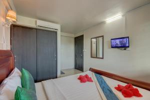 Rúm í herbergi á Siem Reap Pub Hostel