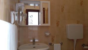 Koupelna v ubytování La Quercia Hotel con Ristorante + 37 fotografií