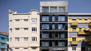 an apartment building with balconies on the side of it at Lisbon Serviced Apartments - Parque in Lisbon