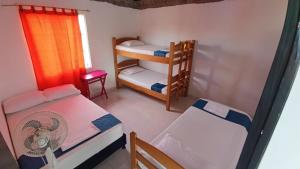 Postel nebo postele na pokoji v ubytování Proyecto tour yuma tatacoa