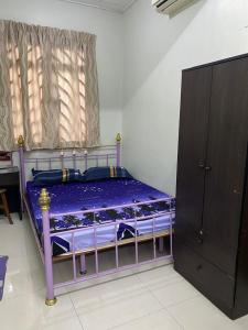 Postel nebo postele na pokoji v ubytování Comfortable Retreat in Megah Ria