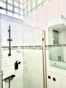 Koupelna v ubytování Hostal Mamà Mambò - Zona Colonial