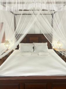 En eller flere senge i et værelse på Sunset view cabana