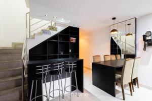 Køkken eller tekøkken på Apto c/ Churrasqueira e Jacuzzi CCG1403