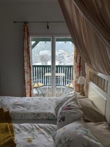 Postel nebo postele na pokoji v ubytování Gasthof Safran + 26 fotografií