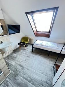 Afbeelding uit fotogalerij van FlyInn-Pension in Leinfelden-Echterdingen