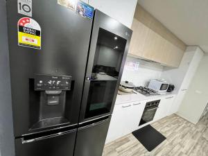 Kuchyň nebo kuchyňský kout v ubytování Comfort Stay Clyde north