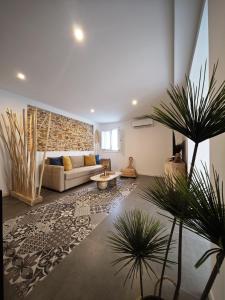 Posezení v ubytování Apartamento El Tanguillo Little Apartments