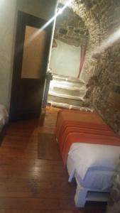 Postel nebo postele na pokoji v ubytování B&B Da Marta