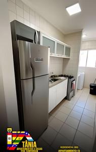 Kuchyň nebo kuchyňský kout v ubytování Apartamentos próximo ao Vitória Régia