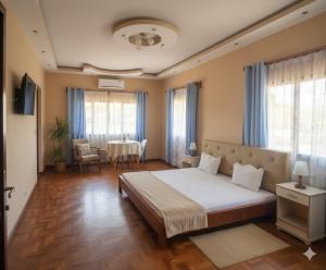 Postel nebo postele na pokoji v ubytování Oceanis Park Andakana