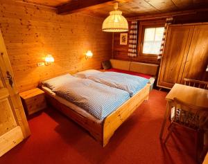 Giường trong phòng chung tại Ferienhaus Unterkircher-Wallner