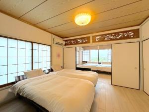 Postel nebo postele na pokoji v ubytování Ashigarashimogun - House - Vacation STAY 17328