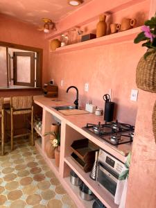 Køkken eller tekøkken på Casa Eva Caraíva - na vila