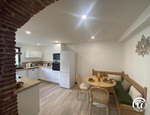 Kuchyň nebo kuchyňský kout v ubytování Aqui sem be