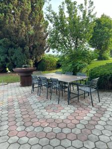 a table and chairs sitting on a patio at Landhaus Weitblick in Paldau +17 photos