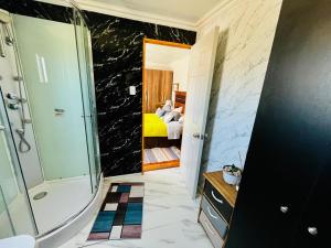 Koupelna v ubytování Hostal Ruta del Desierto + 61 fotografií