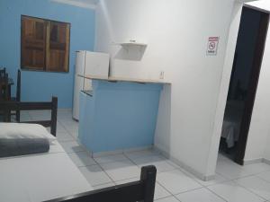 Køkken eller tekøkken på Pousadinha encantos + 19 billeder