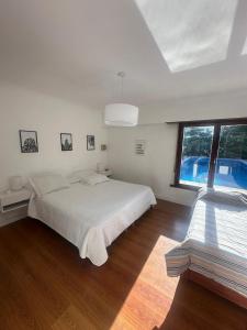 Postel nebo postele na pokoji v ubytování Casa quinta El Paraiso