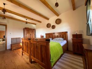 Postel nebo postele na pokoji v ubytování Iža na brejgi