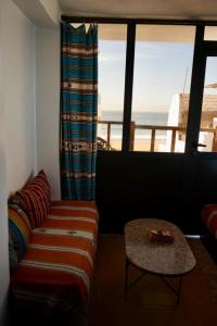 Khu vực ghế ngồi tại tamazirt surf house +58 ảnh