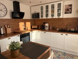 Køkken eller tekøkken på Petit cocon à 5 min de Sedan