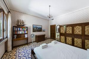 Giường trong phòng chung tại Daller Bianca by Whale Homes +38 ảnh