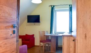 TV/trung tâm giải trí tại Weingut Buschenschank Schneiderannerl