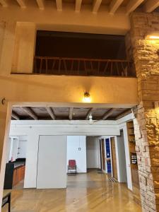 a view of a room with a ceiling at Meridian penthouse in Kolhapur +10 photos