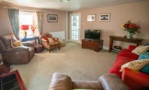 Et tv og/eller underholdning på Wester Campsie Farm House