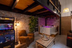 Et opholdsområde på Au spa de LLea Suite rétro