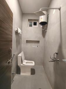 Et badeværelse på Meghana Homestays