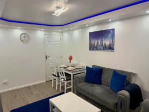 Posezení v ubytování Modern Elegant Home + 22 fotografií