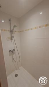 a shower in a bathroom with a shower at La lauzière in Assac +17 photos