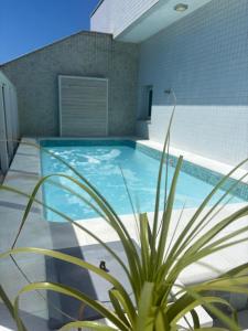 Swimmingpoolen hos eller tæt på Apartamento Duplex (Cobertura) Praia do Forte