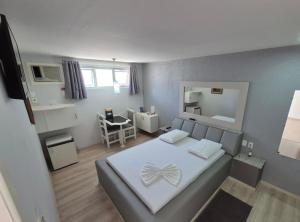 Postel nebo postele na pokoji v ubytování L'acqua Express