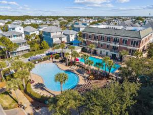 an aerial view of a resort with a pool and buildings at The Magnolia by 30A Escapes in Rosemary Beach