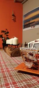 a table with a plate of food on a table at Aux 10 Ponts Maison spacieuse et conviviale au bord de la Somme la mer à 30 min 6 personnes in Pont-Rémy +84 photos