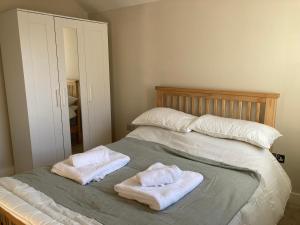 Postel nebo postele na pokoji v ubytování In the heart of the new forest