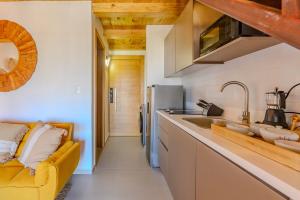 Køkken eller tekøkken på Loft Moderno a Pasos de la Playa con Piscina by Caribbean Paradise Rentals + 9 billeder