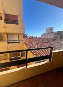 a balcony of a building with a roof at Miramar 19 in Miramar