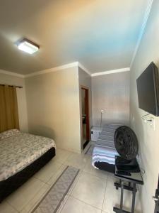 Et tv og/eller underholdning på Ibiza Inn Suítes Uberaba