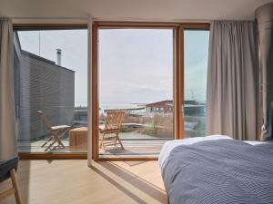 Postel nebo postele na pokoji v ubytování Exklusives Ferienhaus - Direkt am Neusiedler See